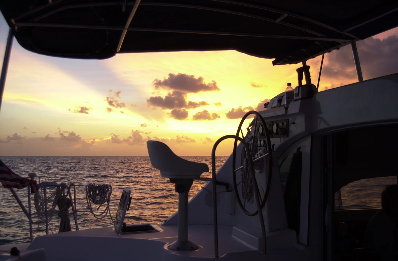 Bali 4.4 — helm and cockpit at sunset